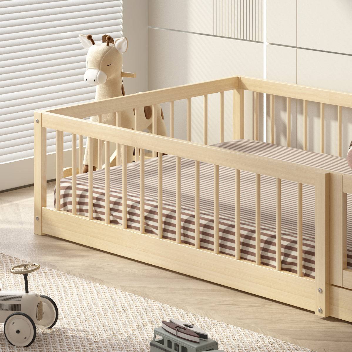 Dream Raft Montessori natural floor bed with protective guardrails and nautical-inspired design in light wood