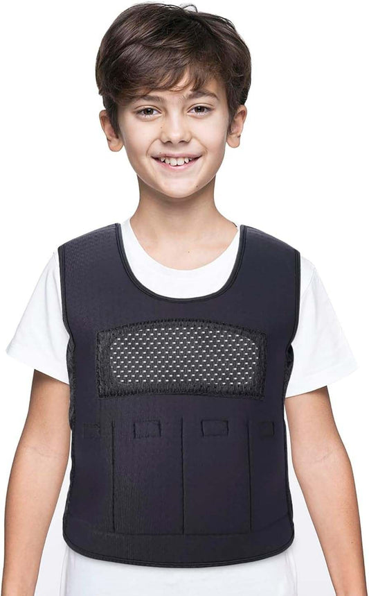 Boy wearing large black weighted vest for kids with breathable mesh and removable weights