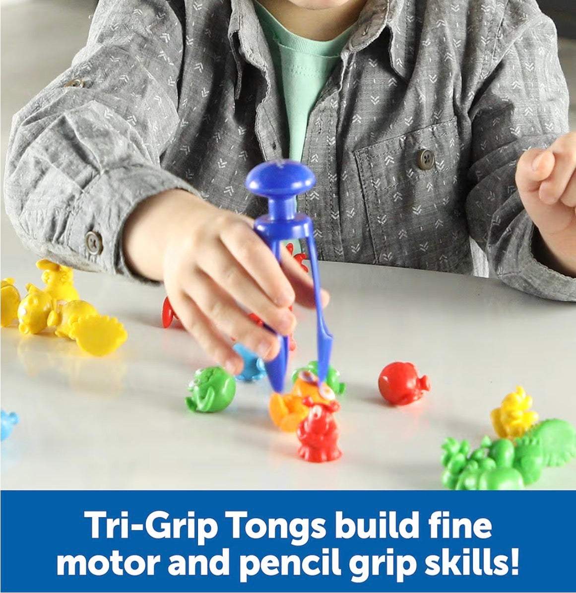 Child using Learning Resources Grab & Sort alien counters with tri-grip tongs for fine motor skill development