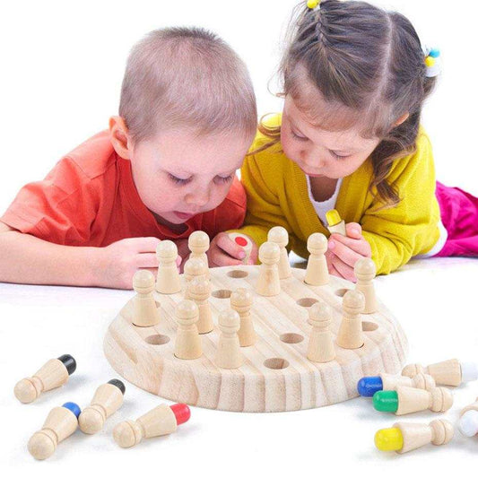 Children playing with Kids Wooden Memory Match Stick Chess Game on wooden board